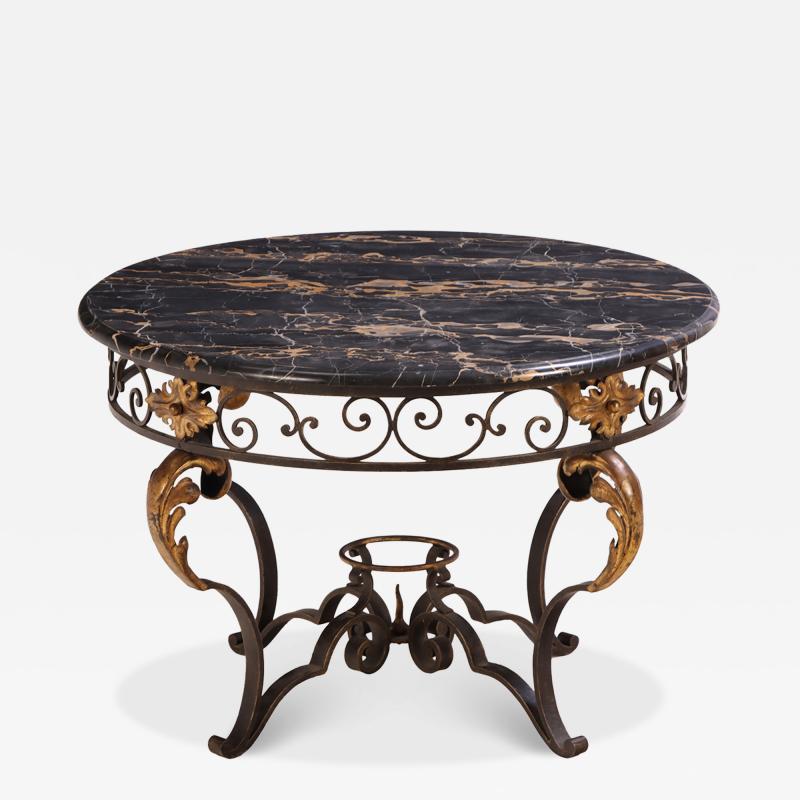 French iron and gilt decorated coffee table with Portoro Nero marble top 