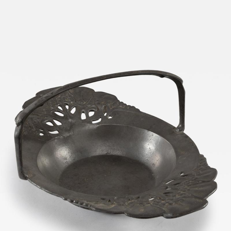 Friedrich Adler Urania An Art Nouveau Pewter Fruit Bowl with a Loop Handle Floral Decoration