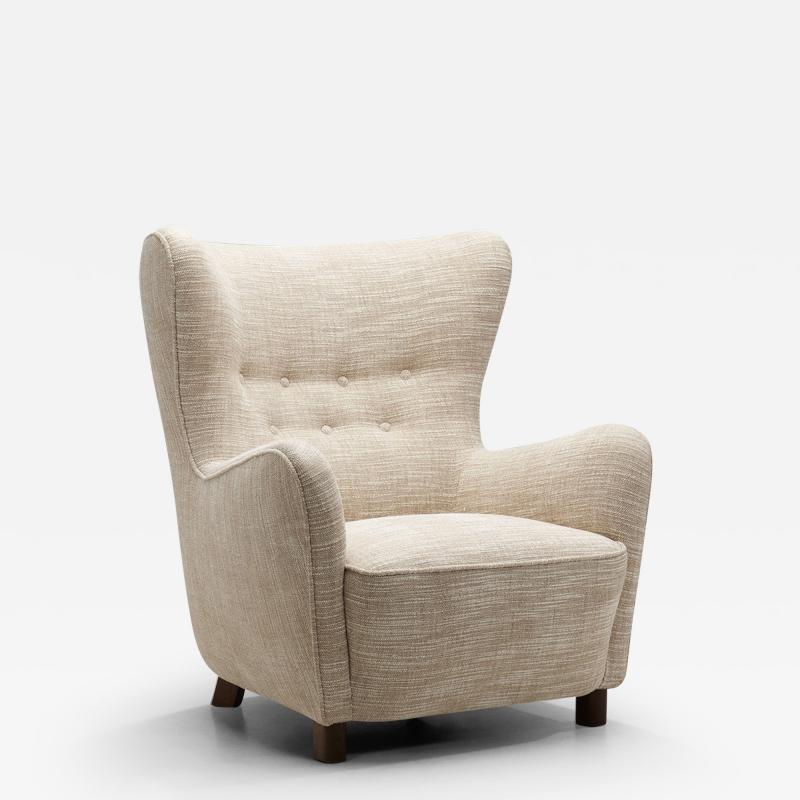 Fritz Hansen Fritz Hansen Model No 1669 Wingback Chair with Beech Legs Denmark 1940s