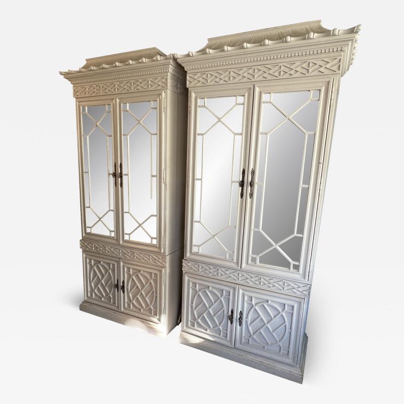GLAMOROUS PAIR OF HOLLYWOOD REGENCY PAGODA FORM MIRRORED WALL CABINETS