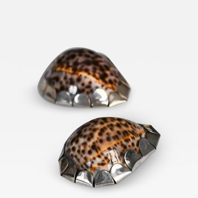 Gabriella Crespi Pair of Gabriella Crespi shells with hand decorated silver metal application