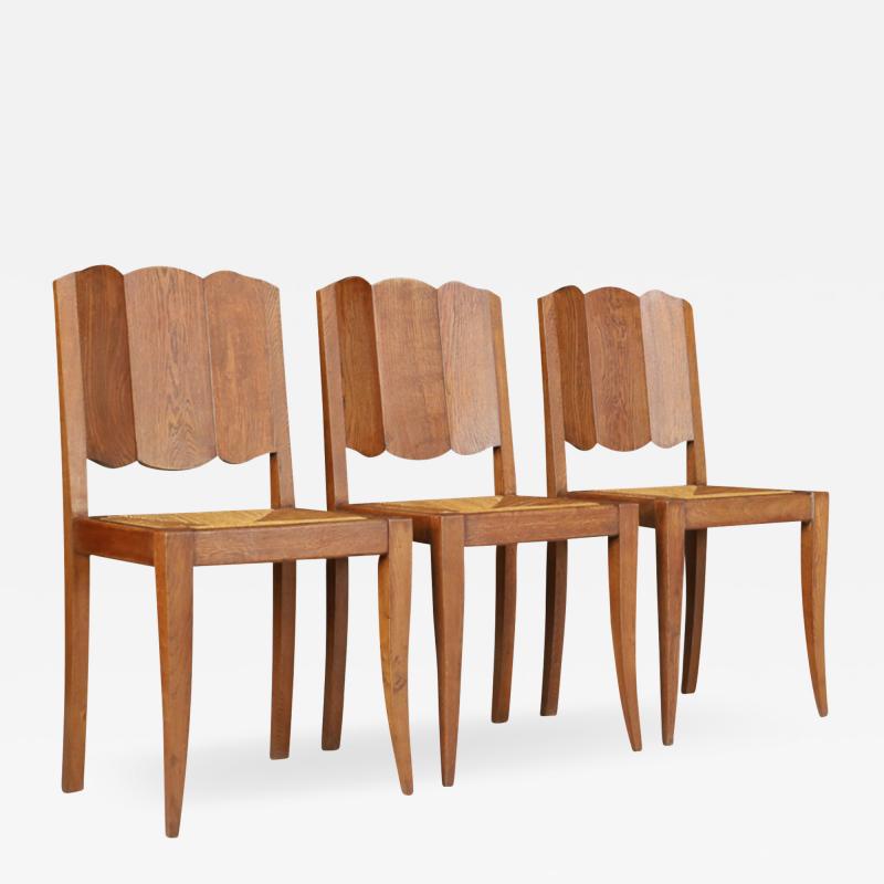 Gaston Poisson Set six 1940s Gaston Poisson oak rush dining chairs