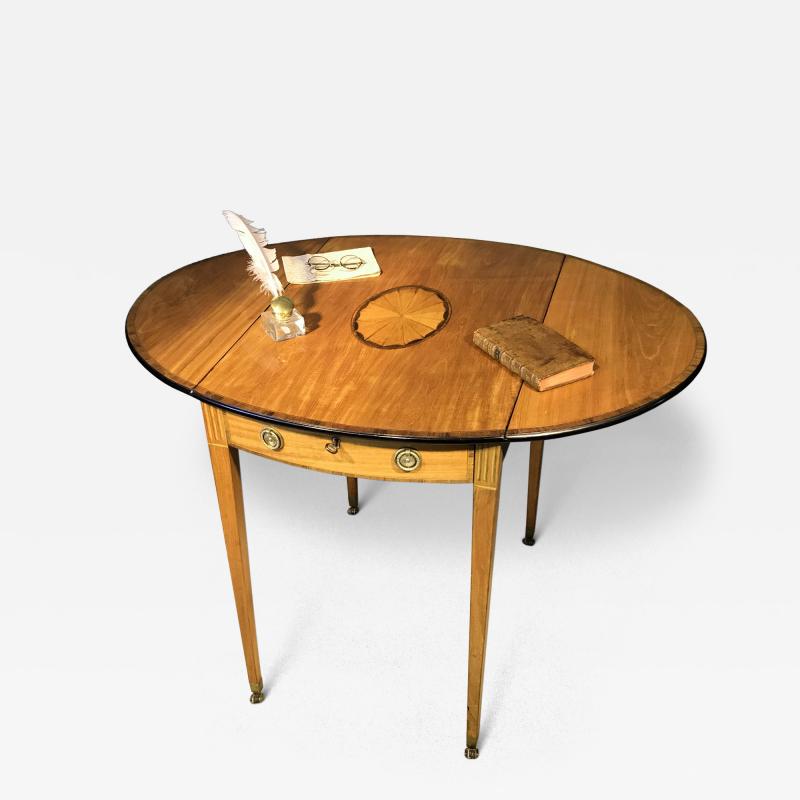 George III Period Satinwood and Rosewood Crossbanded oval Pembroke table