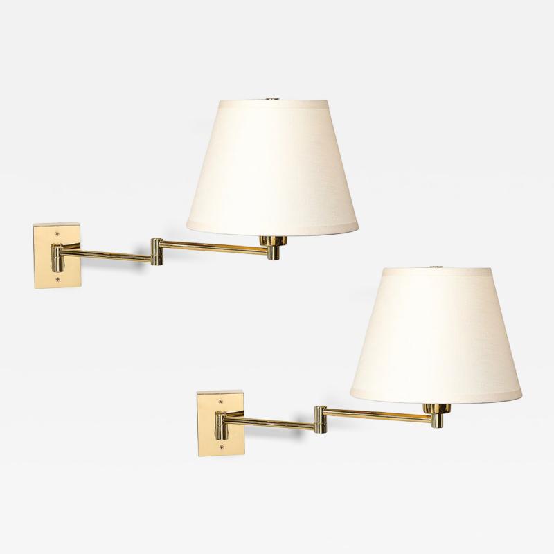 George W Hansen Pair of Mid Century Articulating Wall Sconces by George Hansen for Metarlarte
