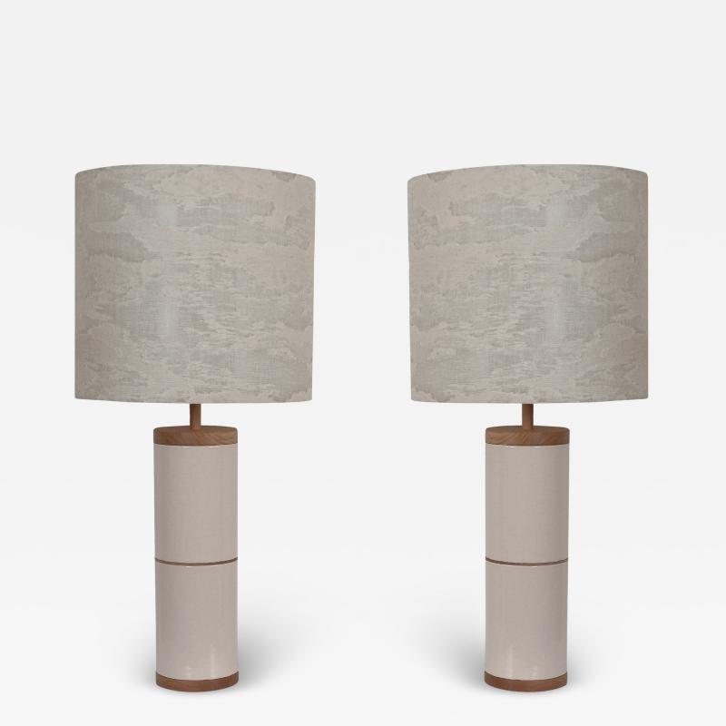 Gerard Simo n PAIR OF EGGSHELL GRAND FEU CERAMIC LAMPS