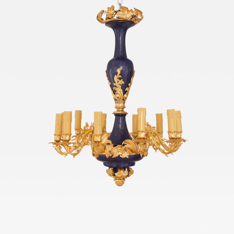 Gilt metal and lapis lazuli twelve light chandelier