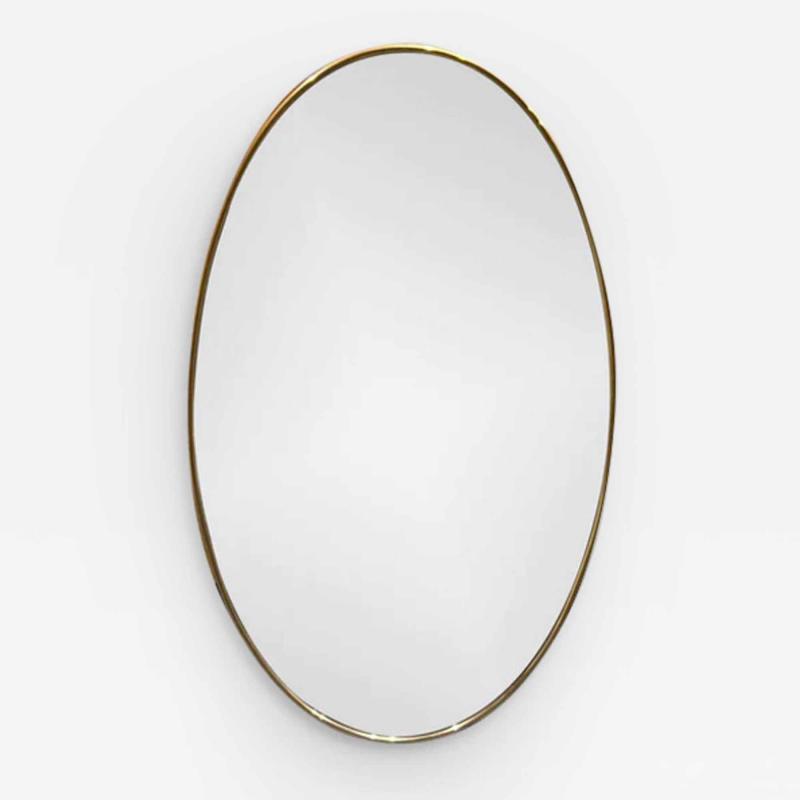 Gio Ponti 1950S OVAL MIRROR IN AGED BRASS ATTRIBUTED TO GIO PONTI FOR FONTANA ARTE