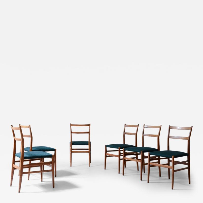 Gio Ponti Set of 6 chairs in black stained wood with fabric covering 