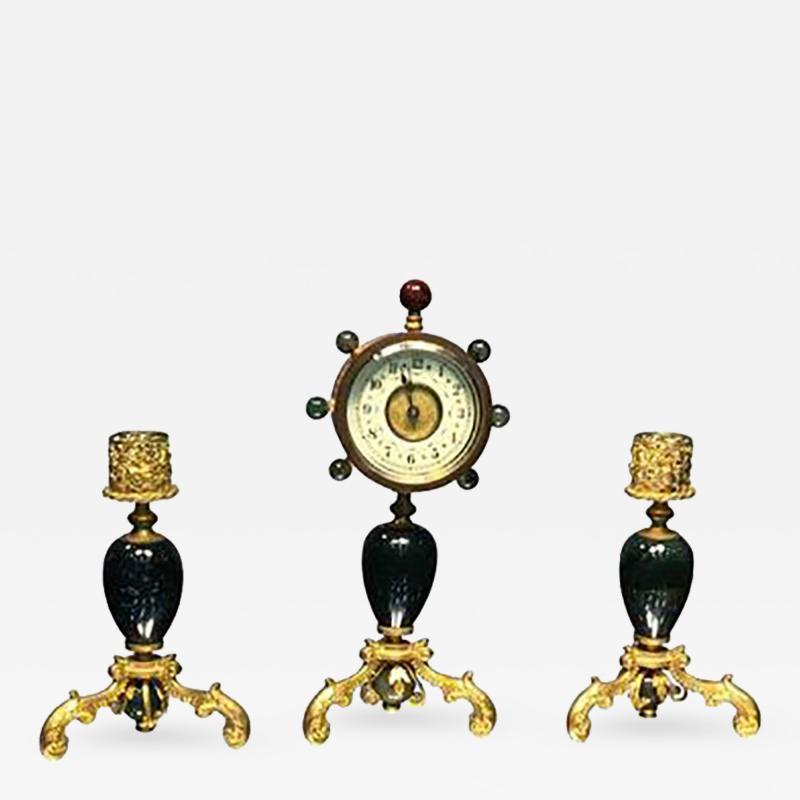 Glamorous Suite of Semiprecious Stone and Dor Bronze Clock and Candlesticks