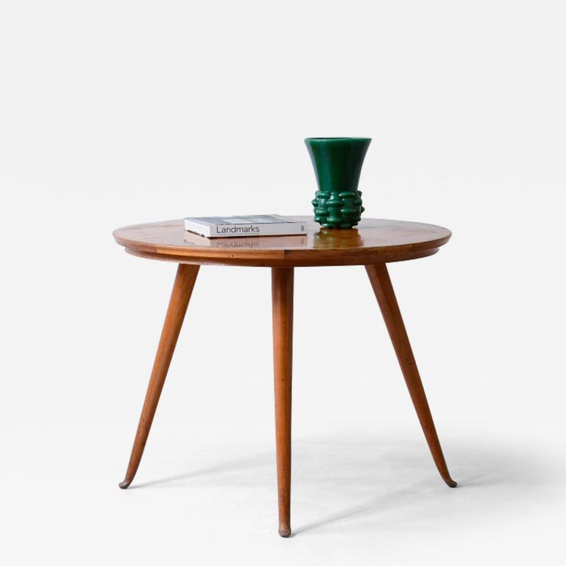 Guglielmo Ulrich Elegant cherry table with thin turned legs and veneered top