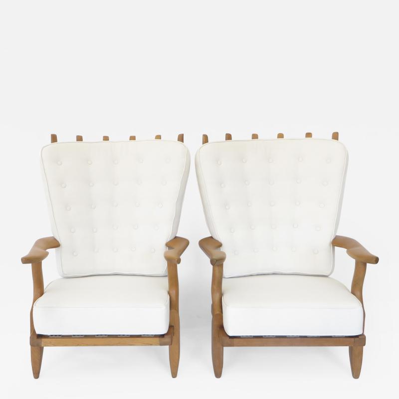 Guillerme et Chambron PAIR OF GRAND REPOS FRENCH OAK LOUNGE CHAIRS BY GUILLERME ET CHAMBRON