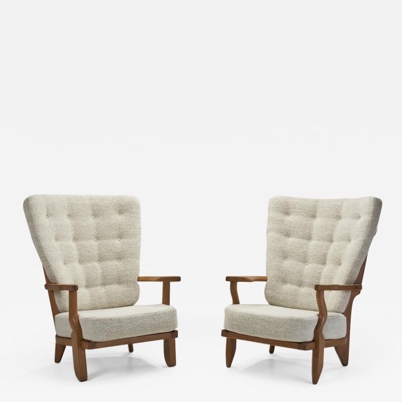 Guillerme et Chambron Pair of Oaken Grand Repos Lounge Chairs by Guillerme et Chambron France 1950s