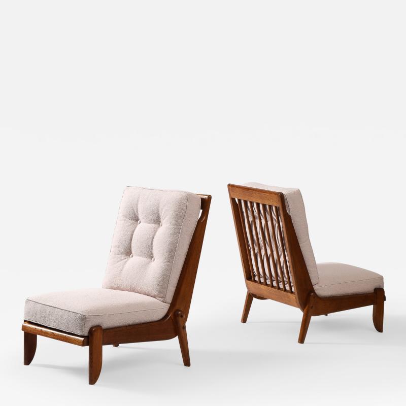 Guillerme et Chambron Pair of Rare Guillerme et Chambron Oak Lounge Chair with Sculptural Legs