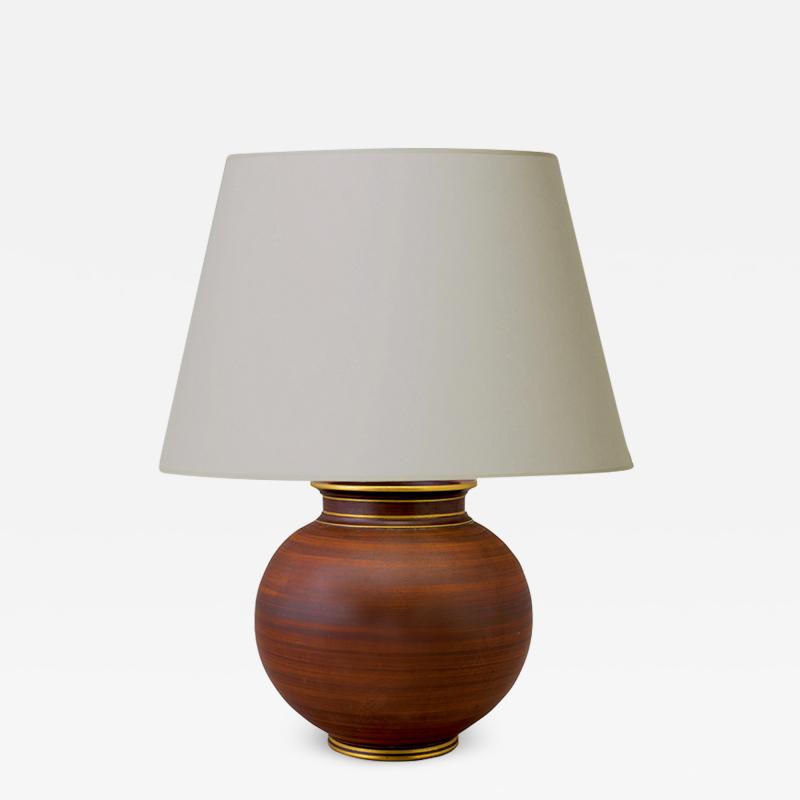 Gunnar Nylund Table lamp with faux bois finish and gilt details by Gunnar Nylund