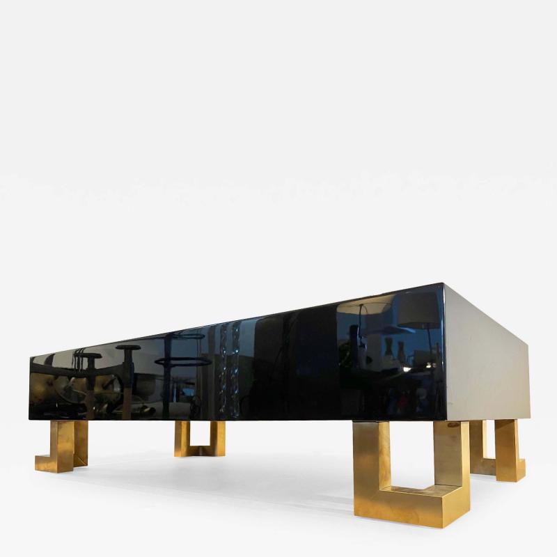 Guy LeFevre Guy Lefebre pure black lacquered coffee table with gold legs