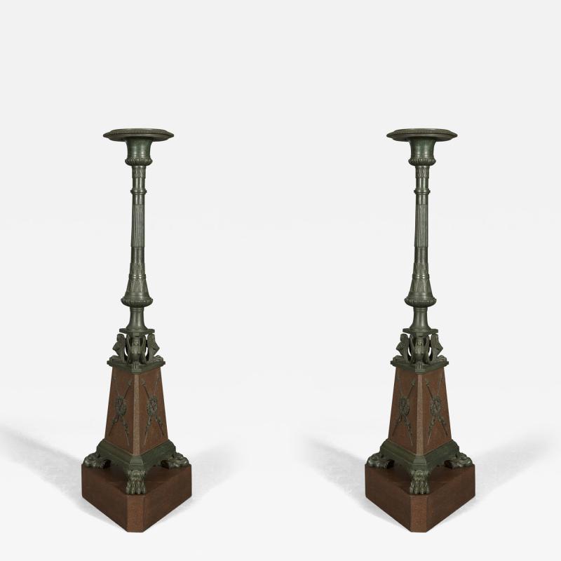 HAREWOOD HOUSE TORCH RES PAIR OF CARVED FAUX BRONZE AND FAUX PORPHYRY TORCH RES