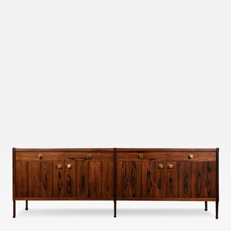 Handcrafted Italian sideboard of the 1960s in rosewood and brass