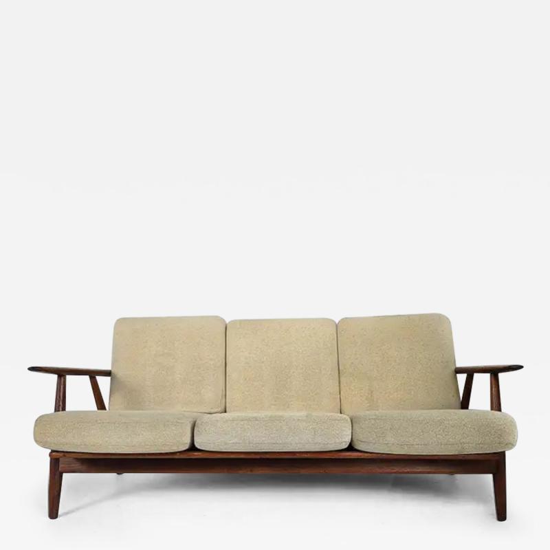 Hans Wegner Danish Mid century Modern Hans Wegner Cigar Oak Sofa by GETAMA circa 1950s