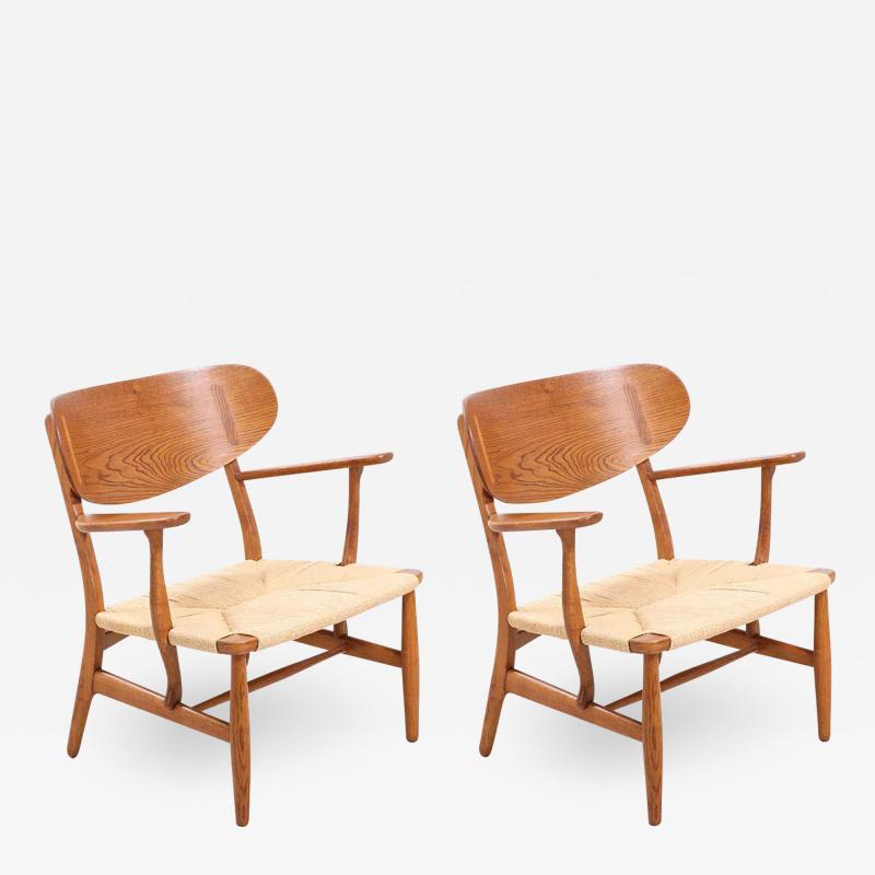 Hans Wegner Pair of Hans J Wegner CH 22 Lounge Chairs for Carl Hansen S n