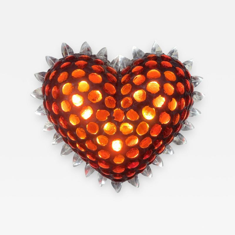 Heart shaped sculptural wall light
