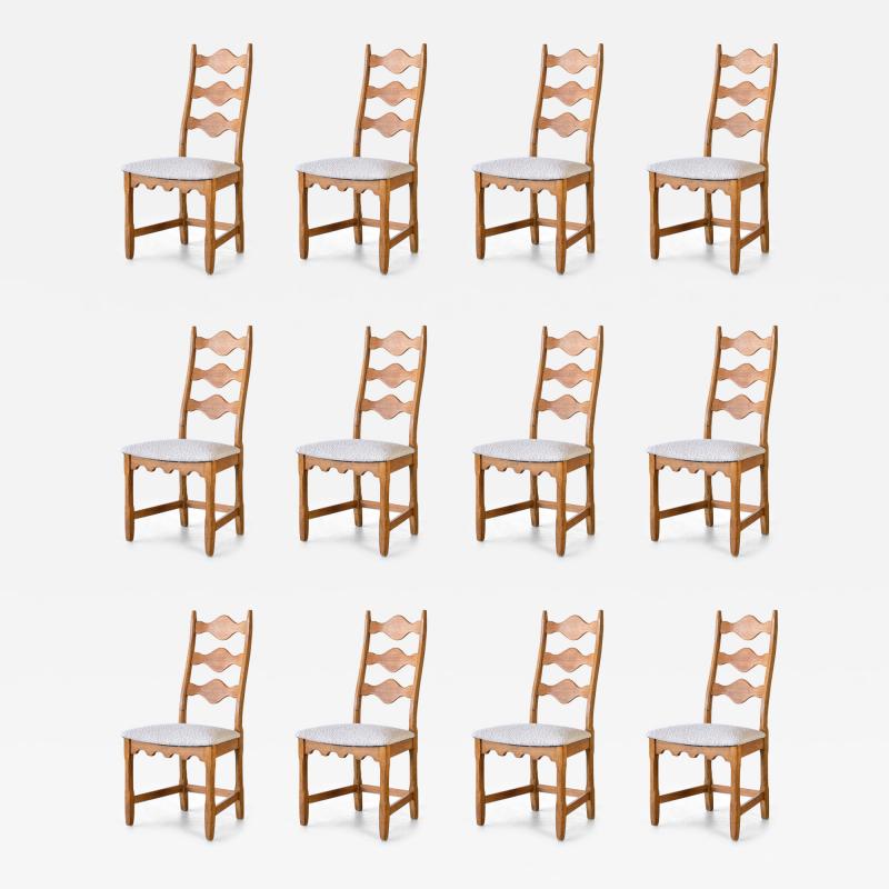 Henning Kjaernulf Set of 12 Henning Kj rnulf Dining Chairs Oak and Ivory Boucl Denmark 1960s