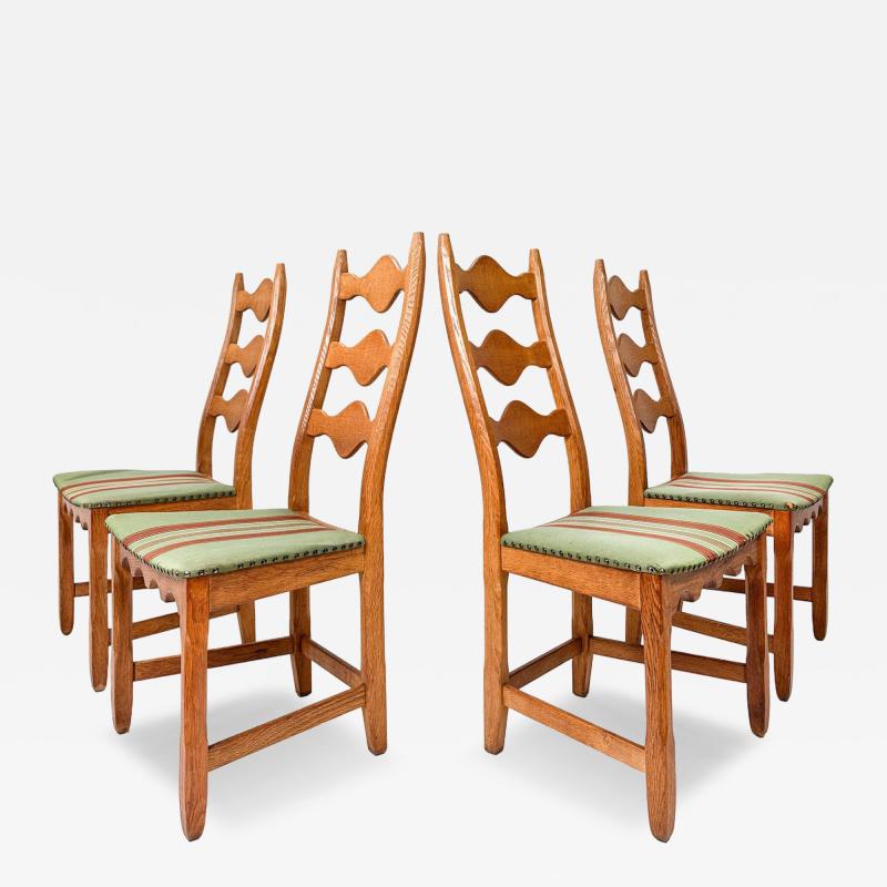 Henning Kjaernulf Set of Four Dining Chairs by Henning Kjaernulf