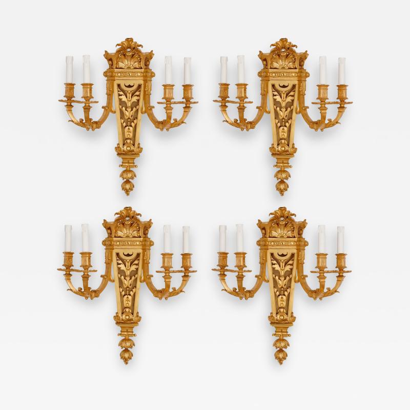 Henri Picard Set of four Baroque style gilt bronze wall lights by Picard