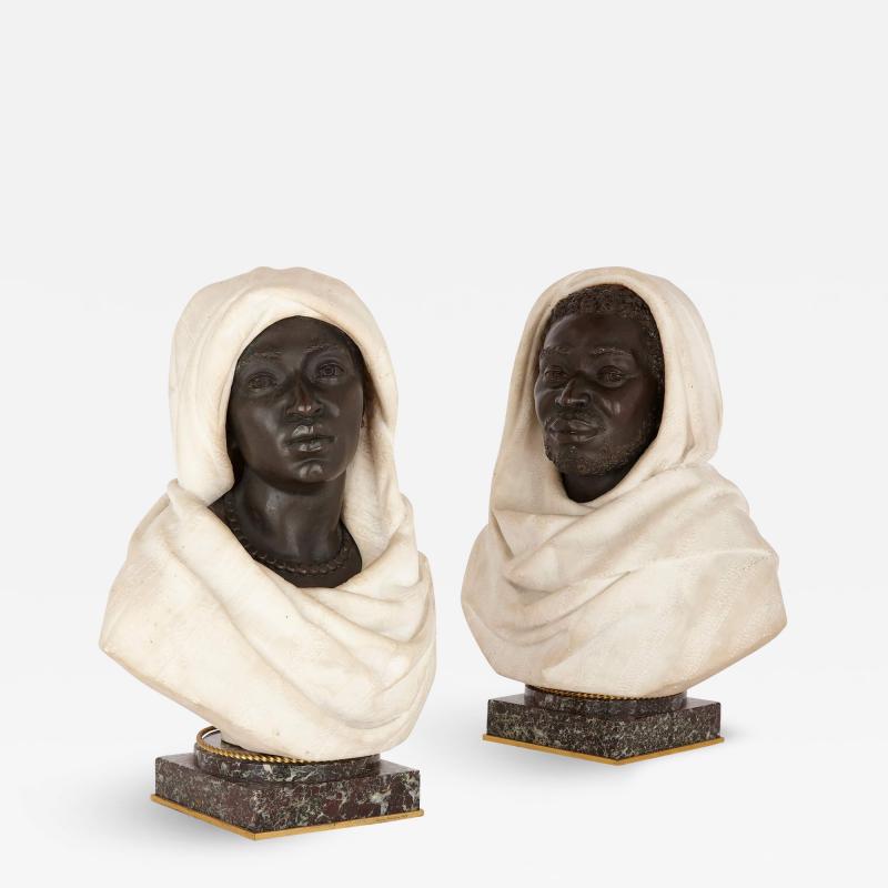 Henry Dasson Pair of bronze and marble busts of a North African man and woman