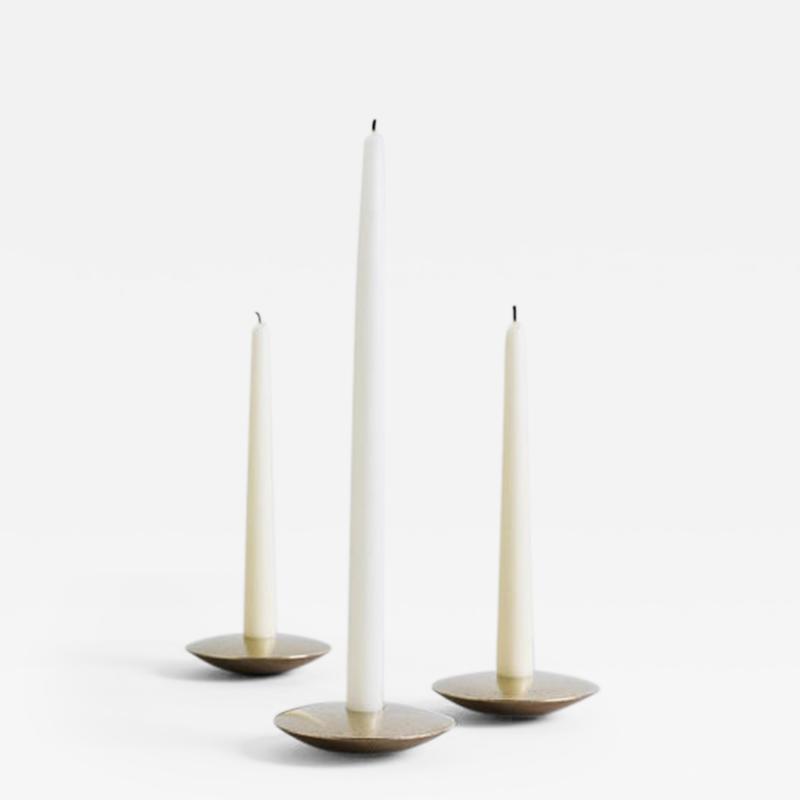 Henry Wilson Ensemble of Three Contemporary Brass Candleholders Henry Wilson