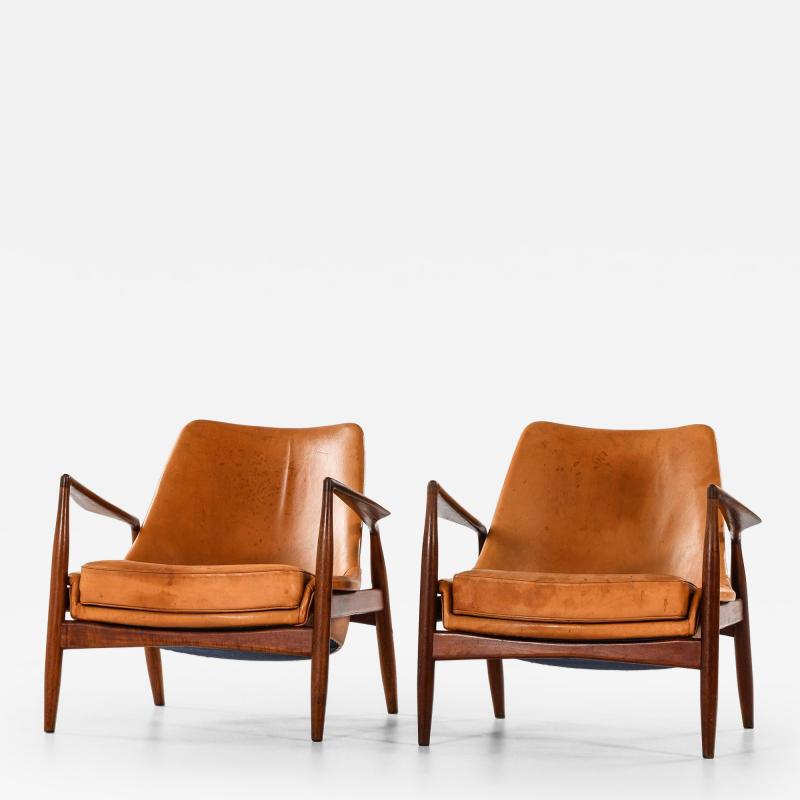 Ib Kofod Larsen Pair of Easy Chairs in Teak and Leather by Ib Kofod Larsen 1950s