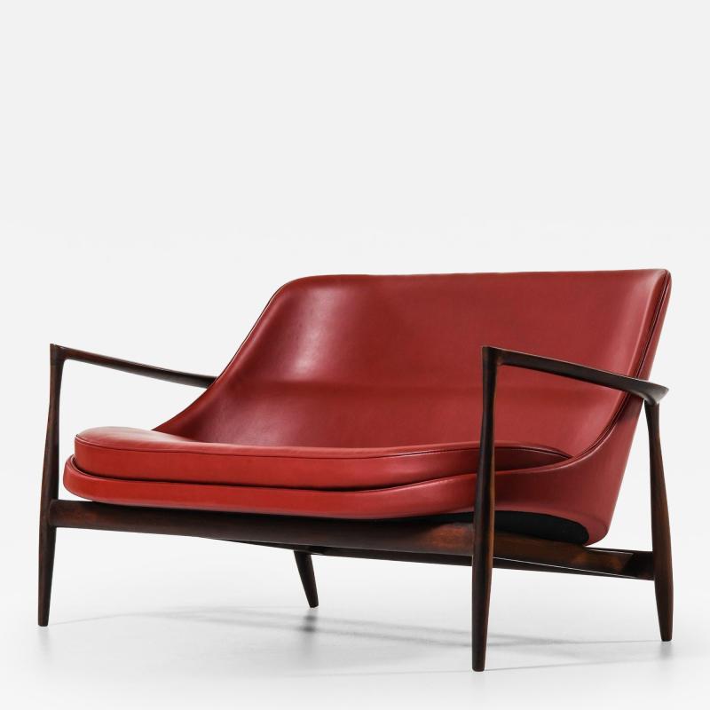 Ib Kofod Larsen Sofa in Rosewood and Reupholstered in Burgundy Leather by Ib Kofod Larsen 1956