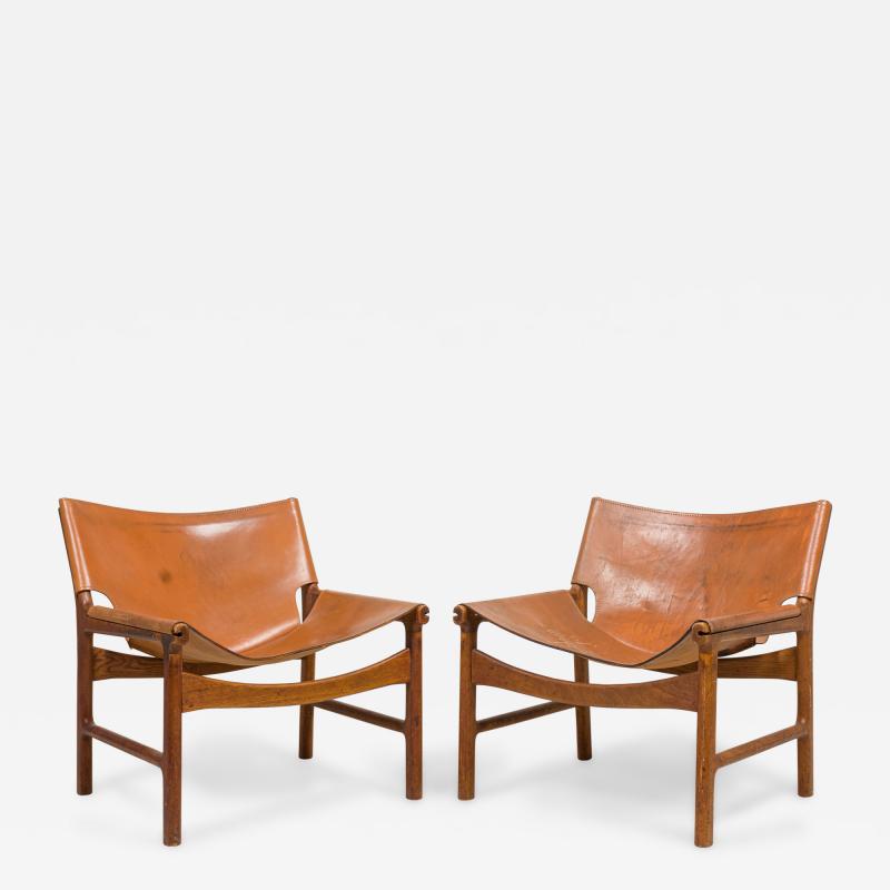 Illum Wikkels Illum Wikkels Danish Caramel Leather and Oak Sling Design Lounge Chairs