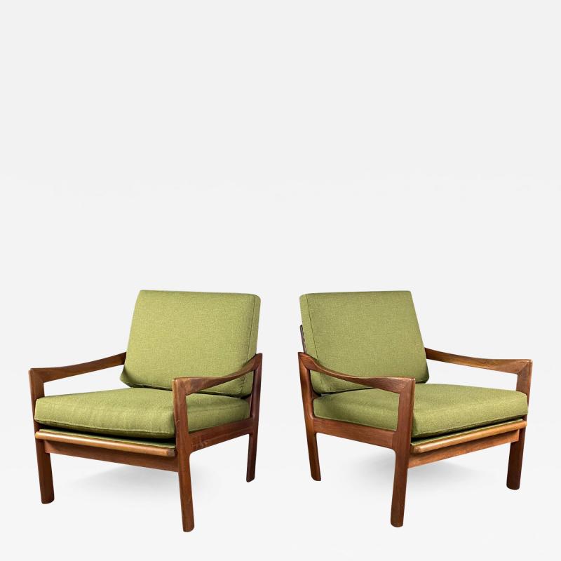 Illum Wikkels Pair 1960s Illum Wikkels teakwood armchairs Denmark