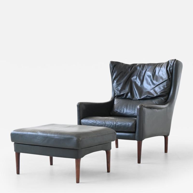 Illum Wikkelso Illum Wikkelso lounge chair and foot stool in leather Denmark 1960