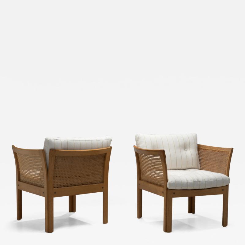 Illum Wikkelso Pair of Plexus Oak and Cane Easy Chairs by Illum Wikkels Denmark circa 1970s