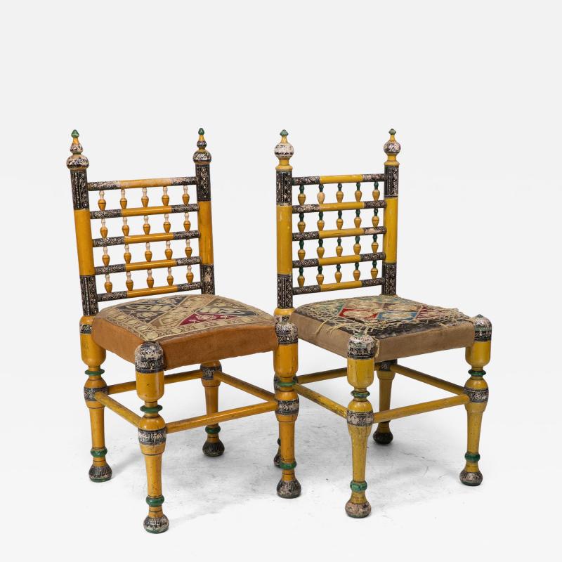 Indian Rajasthani A pair of polychrome painted chairs with gilt chord embroidery