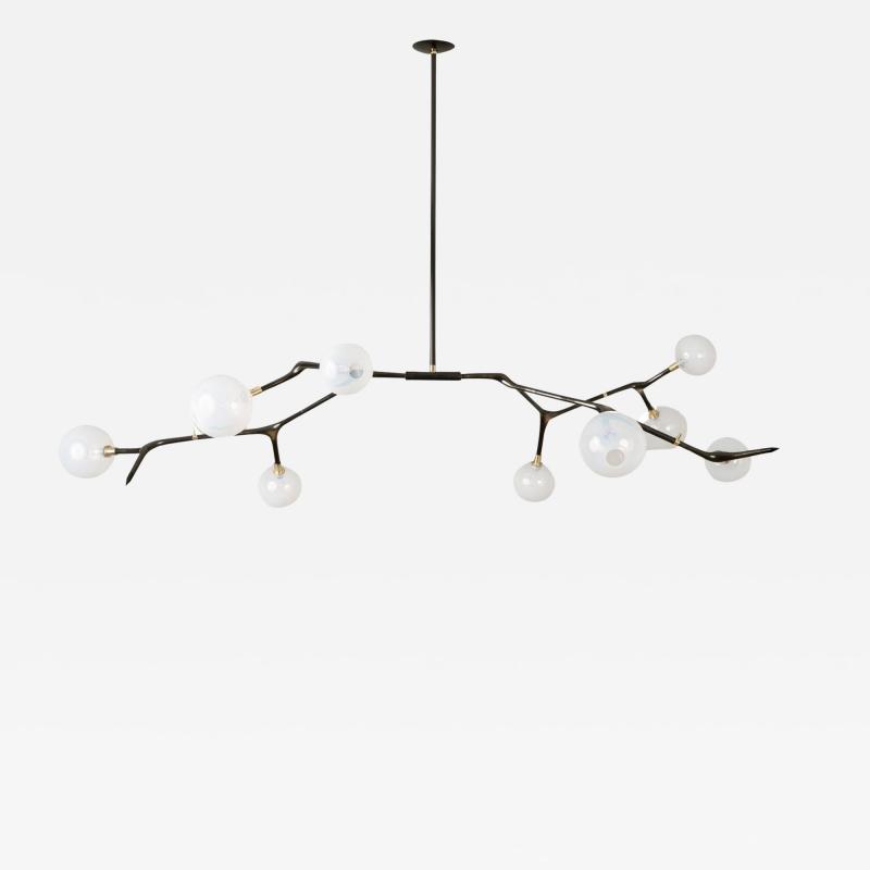 Isabel Moncada MANTIS 9 pendant light Lost Wax Bronze Vintage Finish 9 White Glass Globes