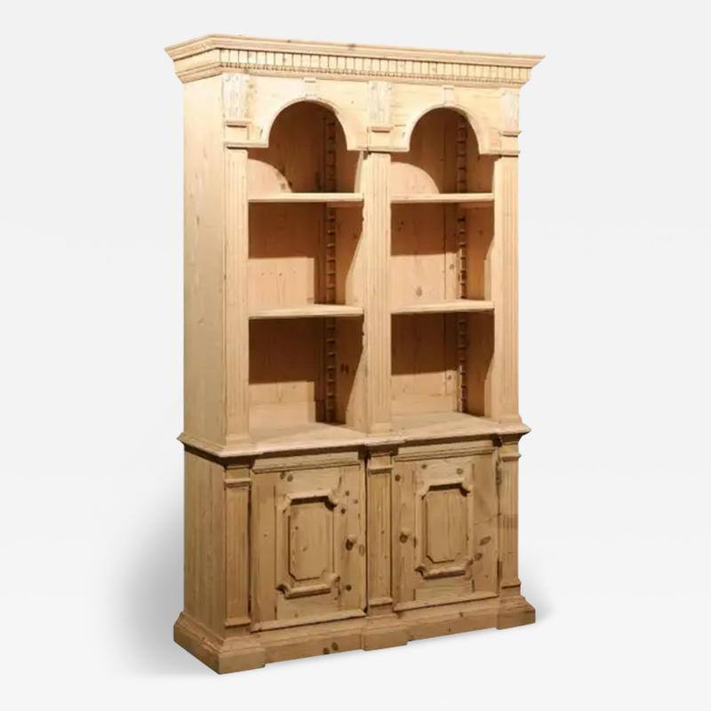 Italian Neoclassical Style Carved Pine Bookcase with Arched Motifs and Capitals