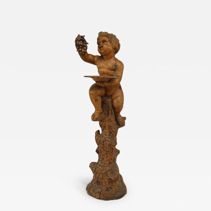 Italian Renaissance style stripped pedestal with cupid holding grapes