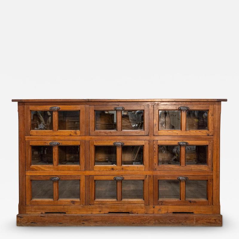 Italian Walnut and Iron Pastaia Shop Cabinet with Nine Drawers and Glass Panels