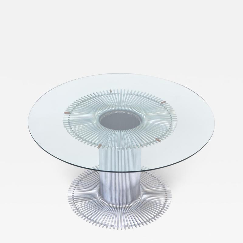 Italian chromed metal and glass dining table in the style of Gastone Rinaldi