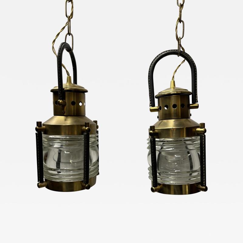 Jacques Adnet 1950s pair of stitched leather lanterns by Jacques Adnet