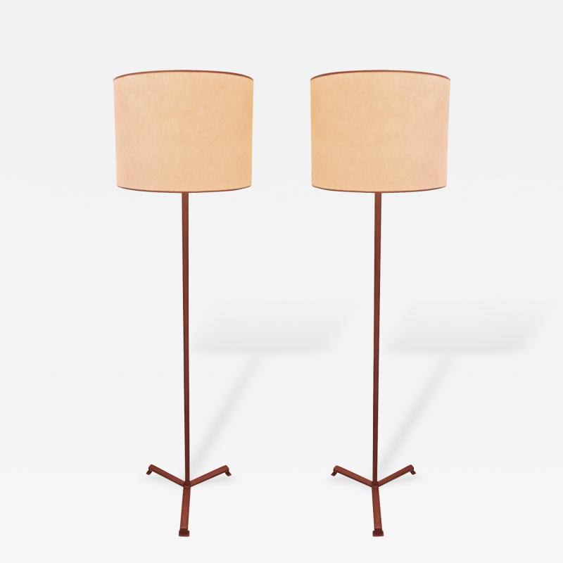 Jacques Adnet Jacques Adnet Brown Hand Stitched Leather Pair of Standing Lamps Tripod Base