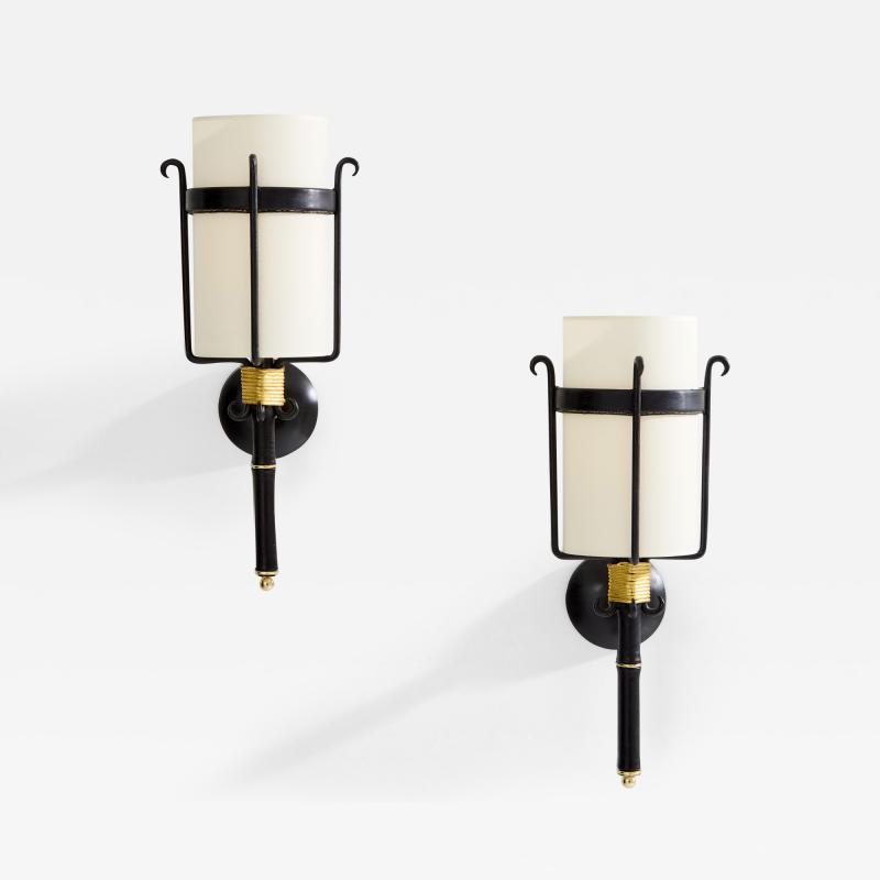 Jacques Adnet Jacques Adnet wrought iron leather and brass wall lights 1950