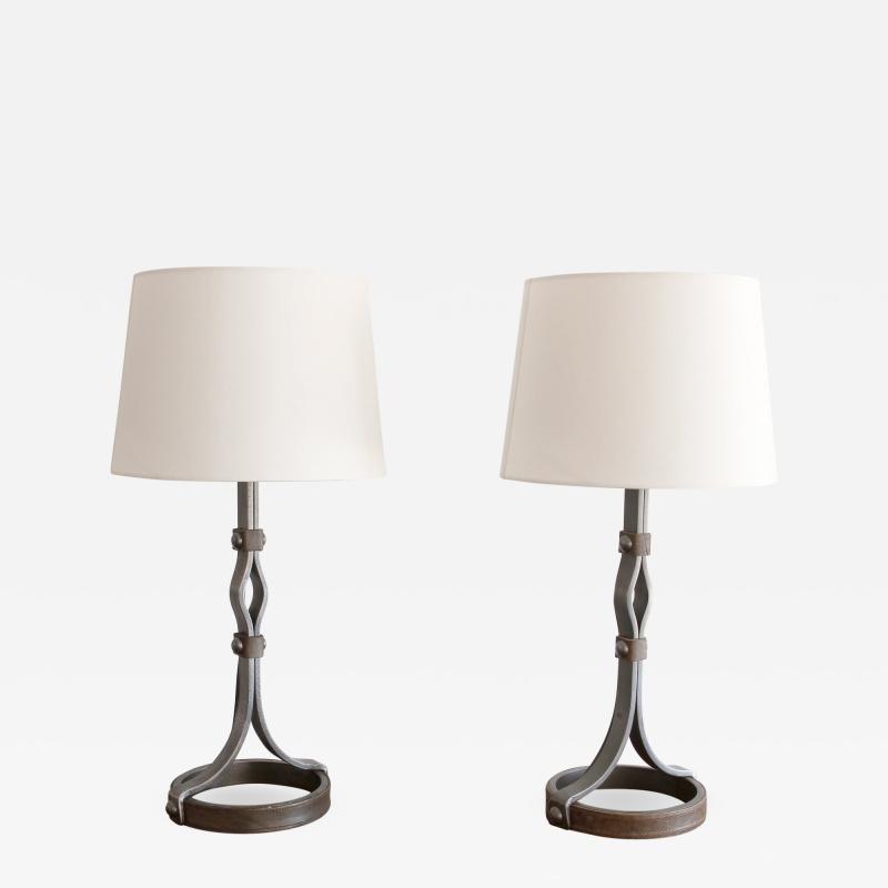 Jacques Adnet PAIR OF JACQUES ADNET IRON AND LEATHER TABLE LAMPS