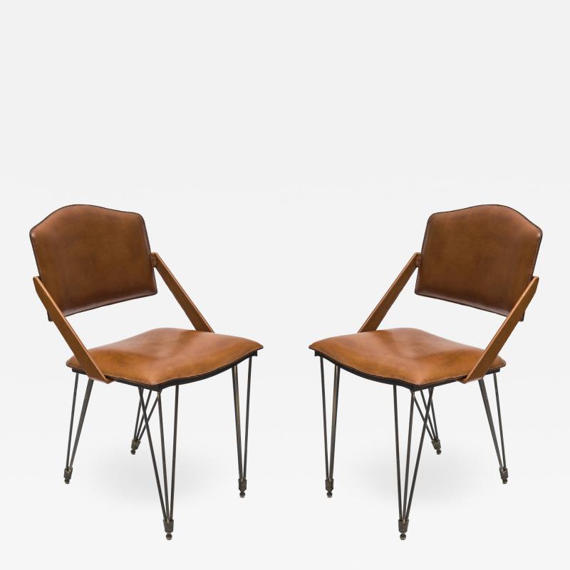 Jacques Adnet Pair Of Stitched Leather Armchairs By Jacques Adnet
