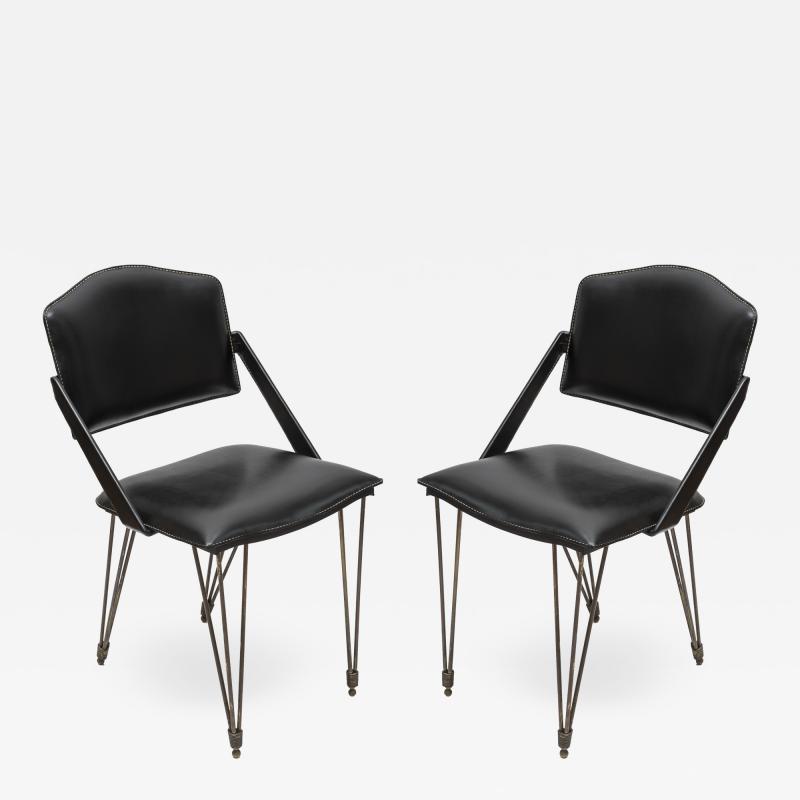 Jacques Adnet Pair oStitched Leather armchairs by Jacques Adnet