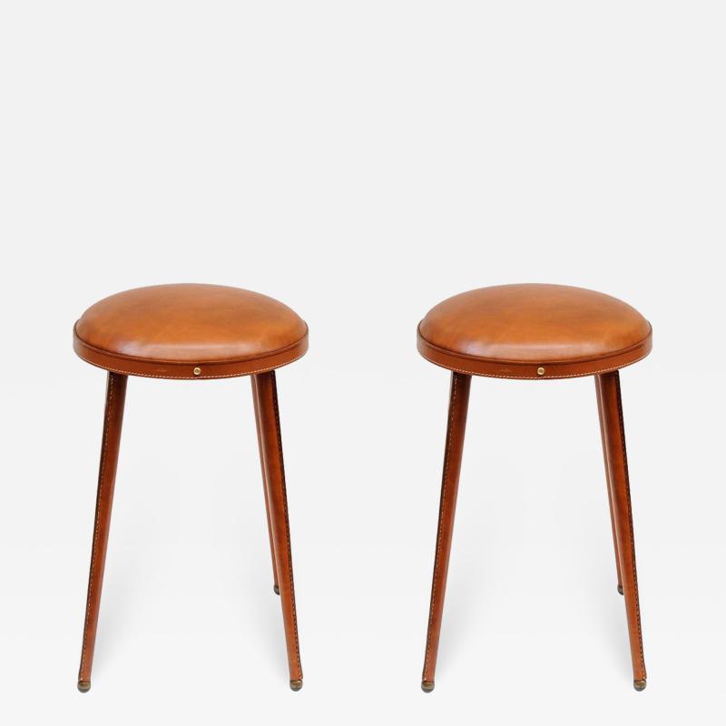 Jacques Adnet Rare pair of Stitched leather stools BY Jacques Adnet