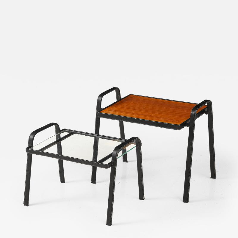 Jacques Adnet Set of two stitched leather nesting tables by Jacques Adnet