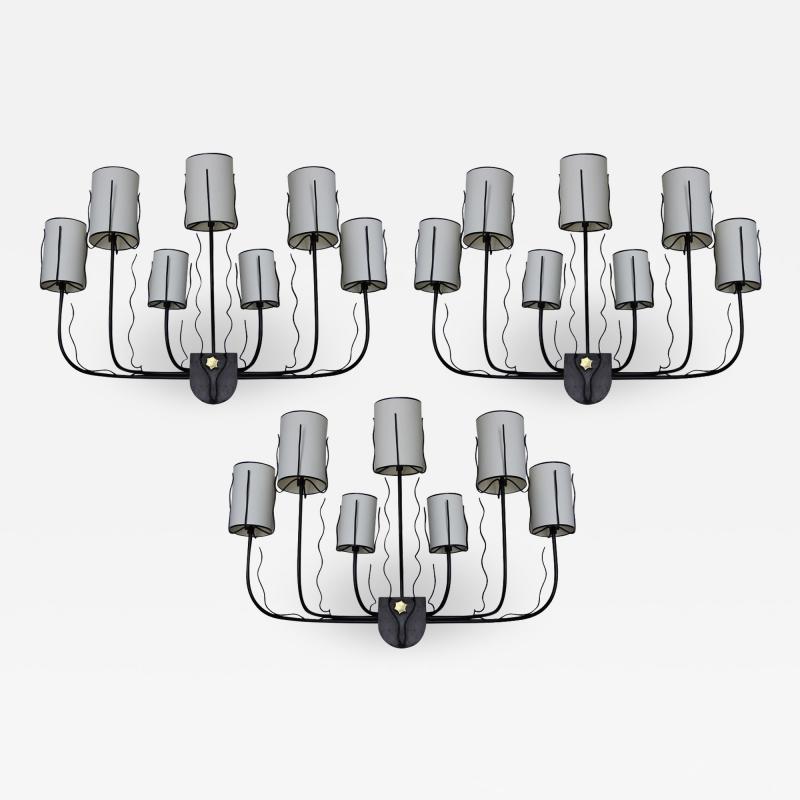 Jacques Adnet Three large 1950 s wall lights by Jacques Adnet France 1950